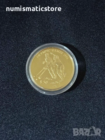 Фиджи 1996 - 50 долара - Летни Олимпийски игри Атланта - Хокей , златна монета, снимка 2 - Нумизматика и бонистика - 51239910
