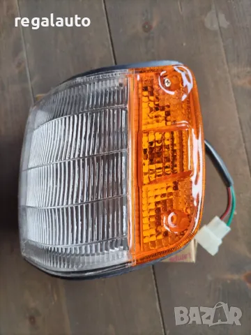 18-1395-01-6B,мигач ляв Mazda 323,1985-1987