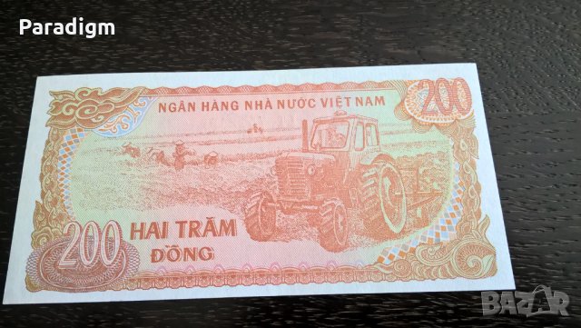 Банкнота - Виетнам - 200 донги UNC | 1987г., снимка 2 - Нумизматика и бонистика - 26220565