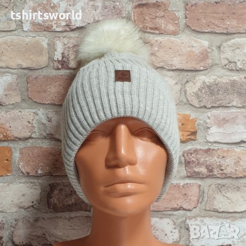 Нова зимна топла дамска Silver Star в светлосив цвят с пух/помпон, снимка 2 - Шапки - 43376170
