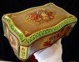 Метална кутия Haribo,цветя,релеф. , снимка 1 - Антикварни и старинни предмети - 34624404