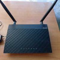 Безжичен рутер N 300Mbps Asus RT-N12-D1, снимка 1 - Рутери - 43998433