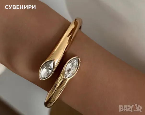 Метална златиста гривна с камъни