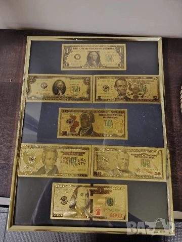 серия от позлатени долари от 1до 100$ в рамка