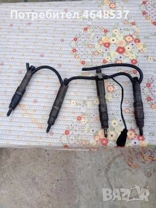 Дюзи 2FHKBEL 581P144 190bar 869G 4броя 50лв за Волксваген Пасат 4 комби 1.9 TDI 1998г. 110к.с, снимка 1