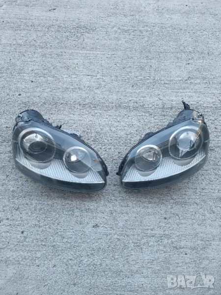 Продавам ОРИГИНАЛНИ GTI / R32 фарове (НАПЪЛНО ОБОРУДВАНИ) 
за голф 5, джета, кади, голф плюс, сеат, снимка 1