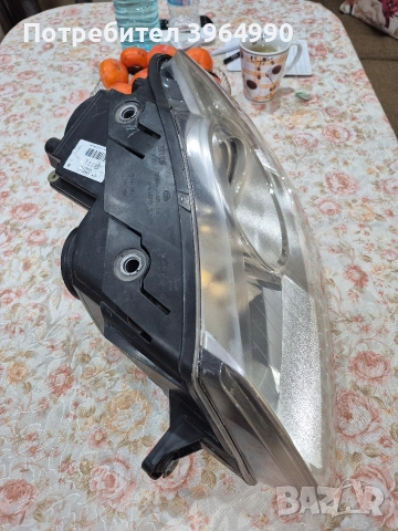 Кристален Оригинален ляв фар HELLA за Пасат В6 , снимка 6 - Части - 52636257