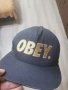 Оригинална шапка Obey. 