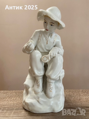 Порцеланова статуетка „Млад геолог“