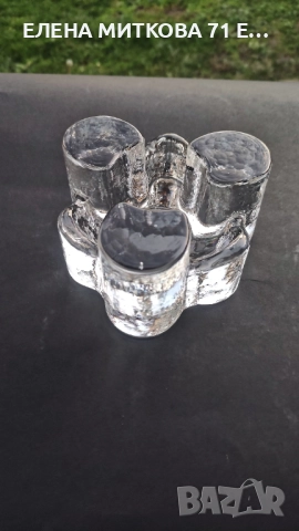 Масивен свещник от кристално стъкло сякаш изваян от лед