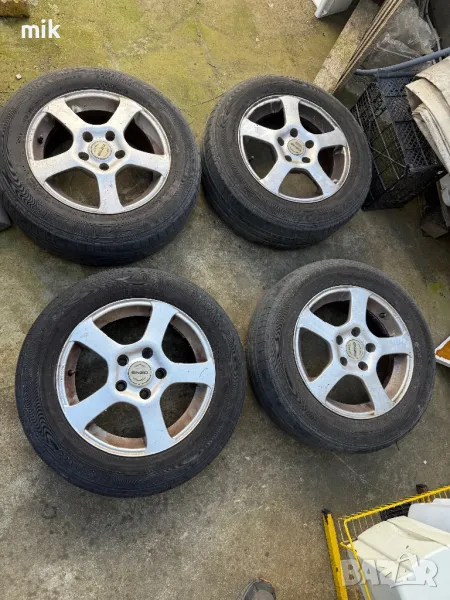 Оригинални ляти джанти от VW с гуми, снимка 1