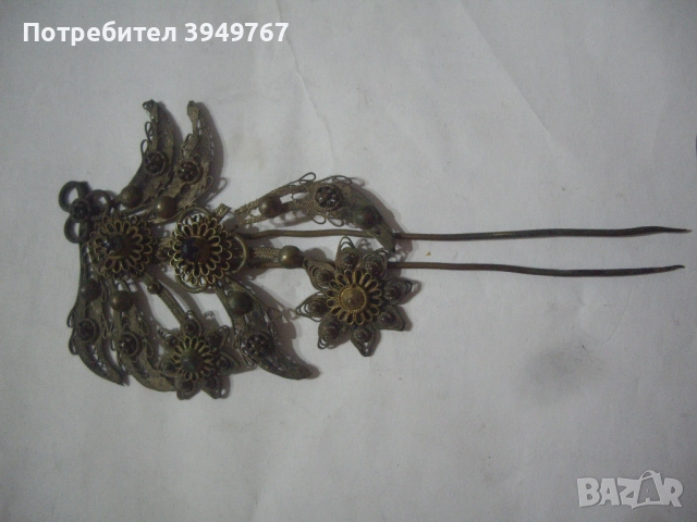 Част от голяма филиграмна игла.