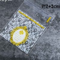 50 бр бяло златни опаковъчни пликчета торбички за дребни сладки или др., снимка 1 - Други - 27490383