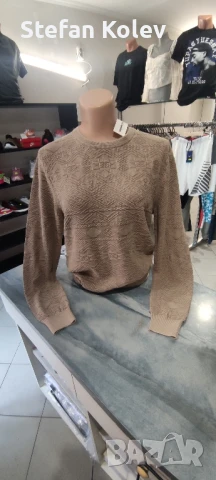 Дамски пуловер.