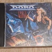 DORO-оригинален диск-MADE IN USA Американско издание Диска има дребни драскотини,които не пречат на , снимка 1 - CD дискове - 43426361