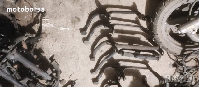 централни стойки за скутери