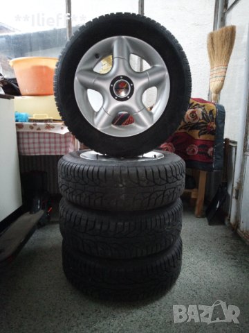 Зимни гуми с джанти, снимка 1 - Гуми и джанти - 42881427