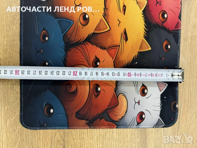 Постелка за клавиатура и мишка.