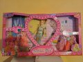 Голям комплект Кукла Барби с 10 рокли за преобличане, снимка 1 - Кукли - 43321820