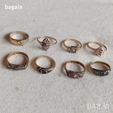 Сребърни пръстени с рубини, сапфири, аквамарин и позлата.