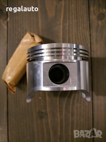 E501-23-200,бутала к-т 77.00+0.50mm MAZDA 323 BD,1980-1986