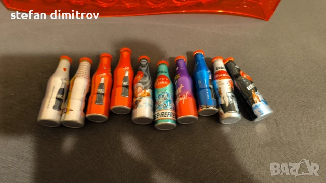 Coca Cola 100 години комплект бутилки, 10 мини алуминиеви бутилки с поставка, снимка 5 - Колекции - 51381111