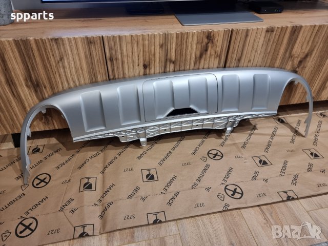 Оригинална добавка за задната броня при VW Passat B7 Alltrack, снимка 3 - Части - 39873444