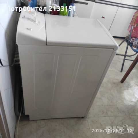 Автоматична пералня Whirpool с горно зареждане 