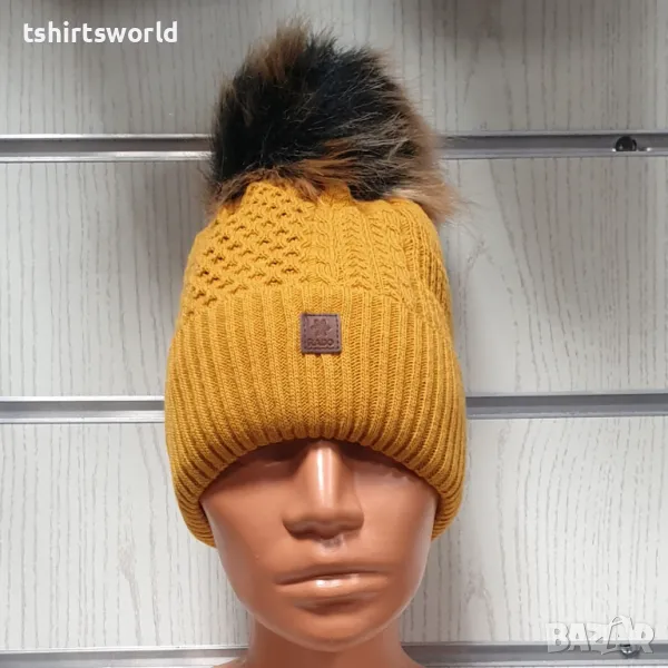 Нова зимна дамска шапка SilverStar в жълт цвят с пух/помпон, снимка 1