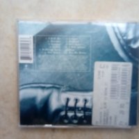 THE CRANBERRIES-оригинален диск., снимка 2 - CD дискове - 33559049