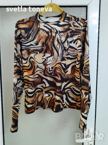 Ефектна трикотажна блуза