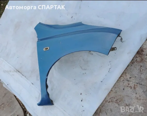 преден десен калник Nissan Micra K12 1.5 DCI 65 конски сили, снимка 1 - Части - 47490105