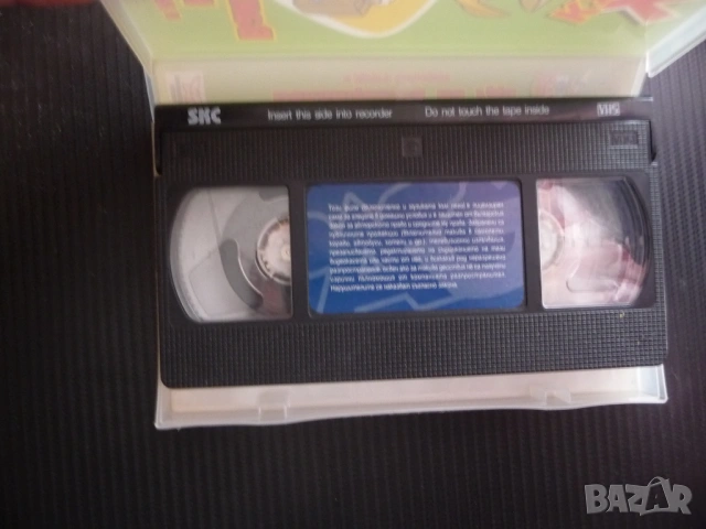 Уди Кълвача VHS филм Ваканцията на Уди и други истории готини анимации Мексиканско чили любим герой , снимка 2 - Анимации - 53230489