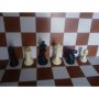Шахматни фигури средно утежнени.  Височина на царя 95,5мм, диаметър на основата 35 мм.