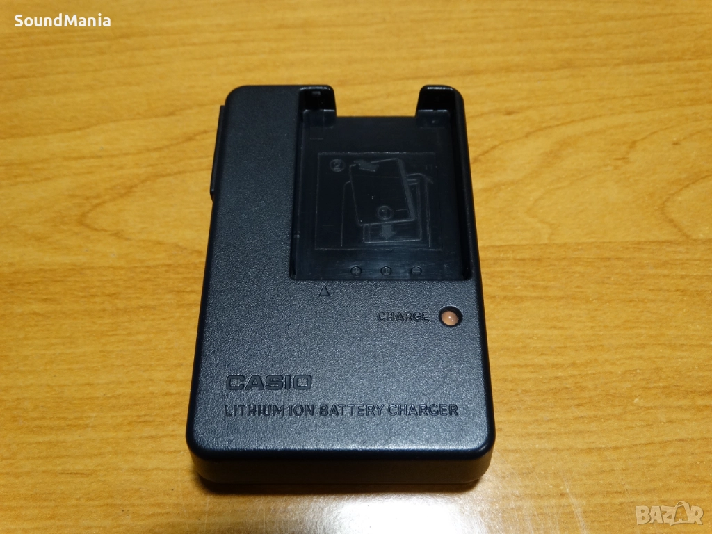 CASIO BC-11L - зарядно за фотобатерии ..., снимка 1