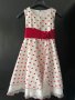 Бяла рокля на червени точки с панделка 7-8 годинки, снимка 1 - Детски рокли и поли - 43380601