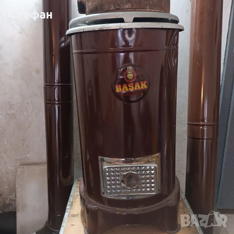 Емайлирана отоплителна печка с горно горене.