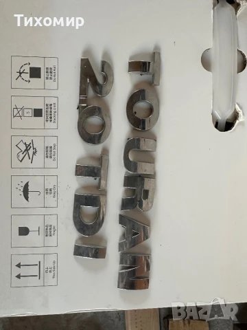 Надпис TOURAN 2.0TDI