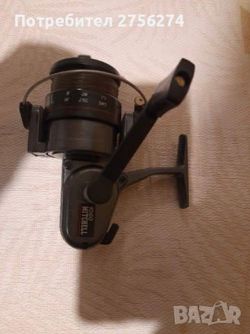 Риболовна макара MITCHELL 1060, снимка 8 - Макари - 53393422