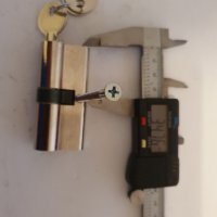 Патронник със секретни ключове 70 мм (68 мм)   равностранен, снимка 2 - Входни врати - 35010785