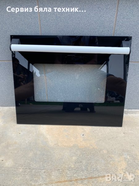 Продавам перфектно предно стъкло с дръжката за вратата на готварска печка VOLTEL (Snaige) модел SE13, снимка 1