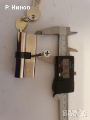 Патронник със секретни ключове 70 мм (68 мм)   равностранен, снимка 2 - Входни врати - 35010785