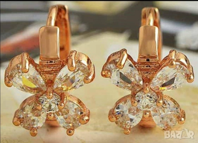 Нежни обеци "панделка" от 9к попълнено злато с цирконии 15 лв.