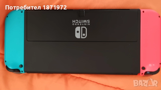 Продавам Nintendo Switch OLED ,пълен комплект + 2 оригинални игри, снимка 7 - Nintendo конзоли - 52863054