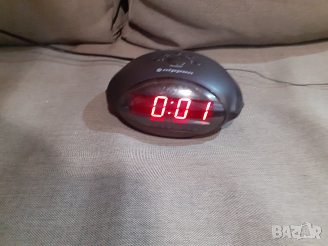 Продавам Радио часовник - будилник Nippon NP 295 със големи цифри светещи в тъмното, снимка 1 - Радиокасетофони, транзистори - 37690384