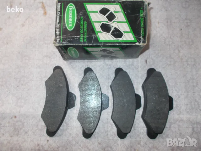 Накладки Форд Ескорт 