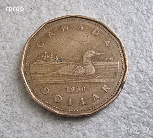 Монета. Канада . 1 долар . 1990 г.