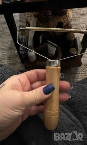  Ръчен уред за премахване на мъх и топчета от дрехи  