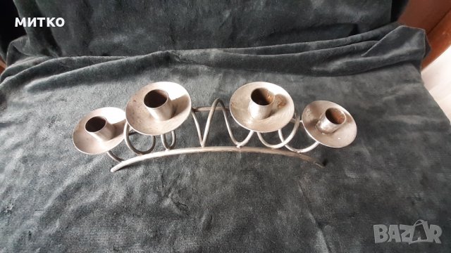 Каминен свещник