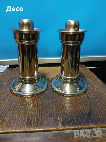 Стари антикварни свещници със пружинен механизъм.